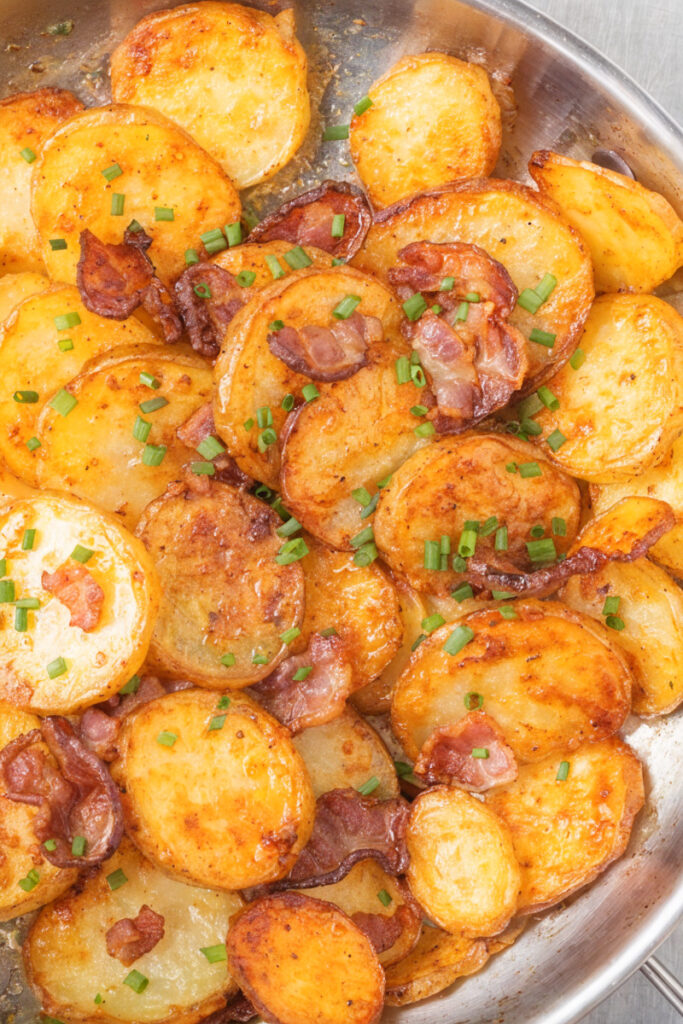 Bratkartoffeln (German fried potatoes with mushroom and onions)