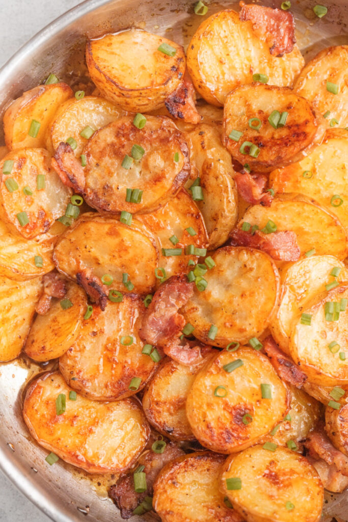 Bratkartoffeln (German fried potatoes with mushroom and onions)